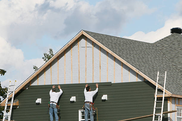 Professional Emergency Siding Repair technician working in Carroll, OH